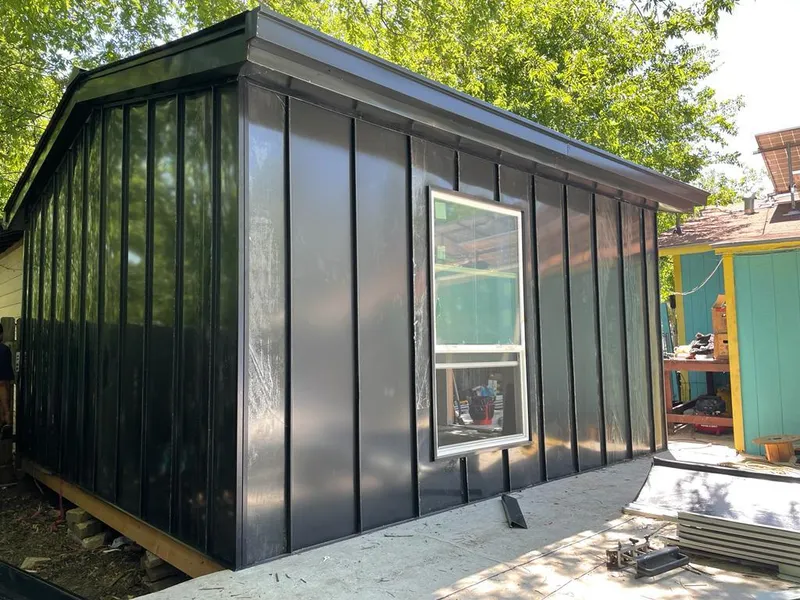 Black standing seam metal wall panels for Metal Roof Installation in Ottumwa