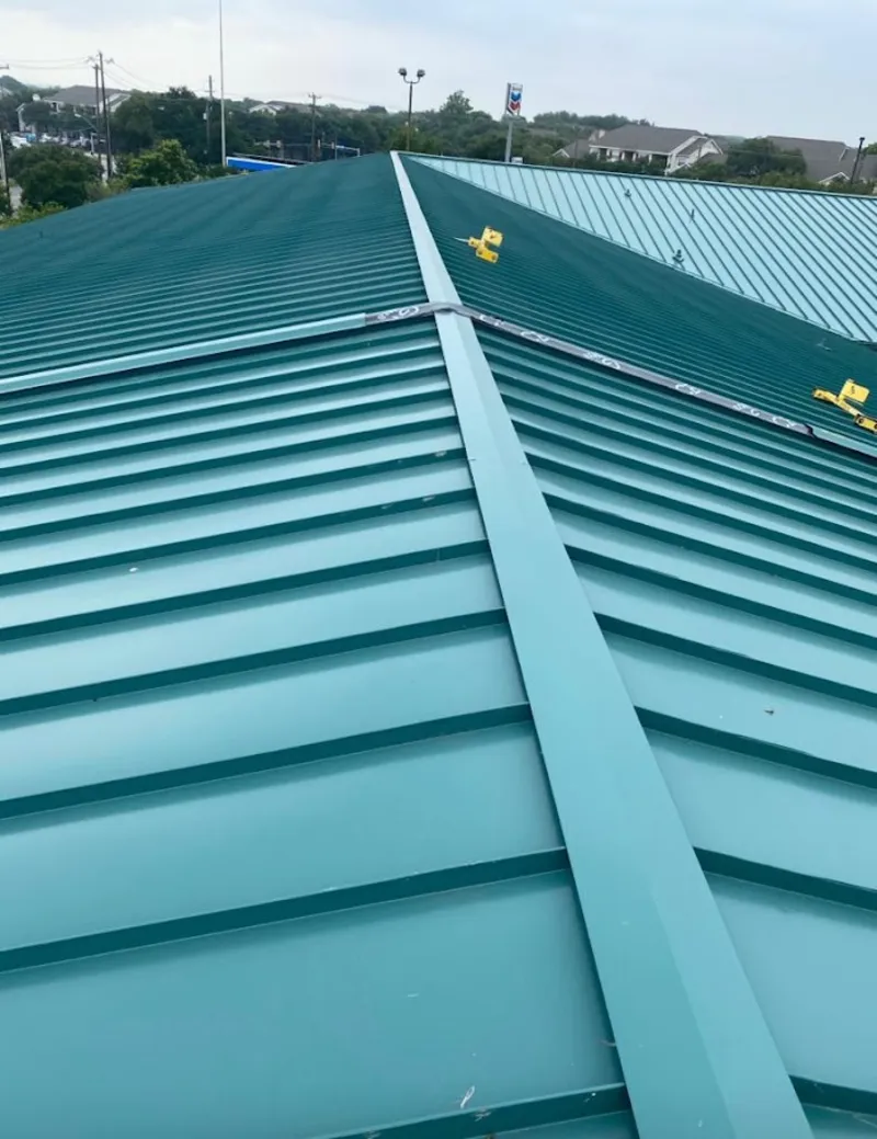 Green commercial metal roof ridge and valley for Metal Roof Repair in Ottumwa